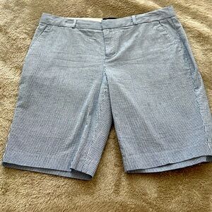 Bermuda shorts in blue pinstripe; new without tags